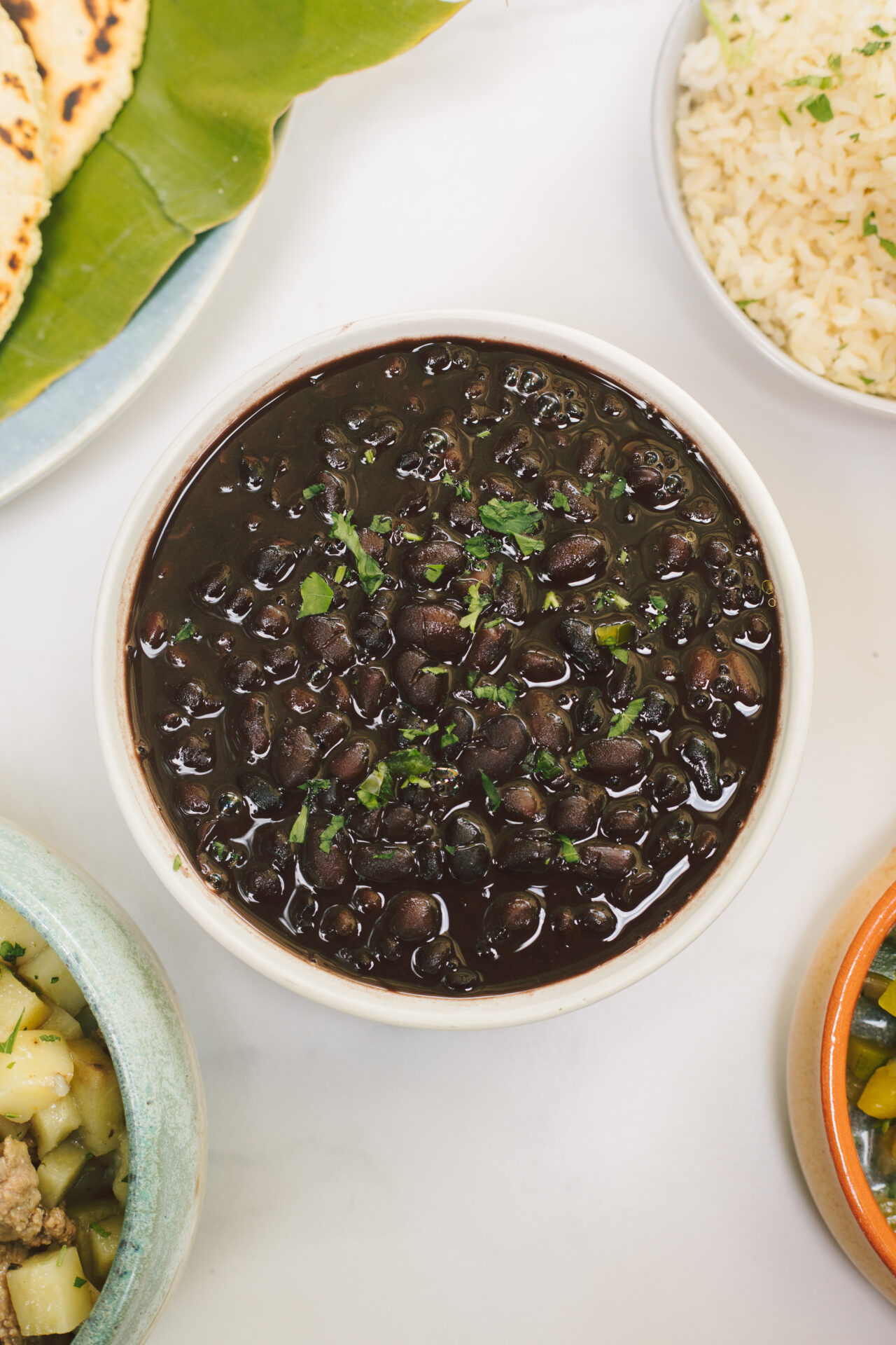 FRIJOLES NEGROS  ARREGLADOS- 250 gramos